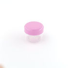 Pequeños envases plásticos coloridos 15g con las tapas para los cosméticos