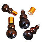 Botellas de aceite esencial de Amber Glass Odm Roll On de la calabaza con la bola de acero inoxidable del masaje
